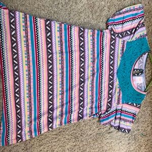 The yellow is a xs and the other is a 14-16